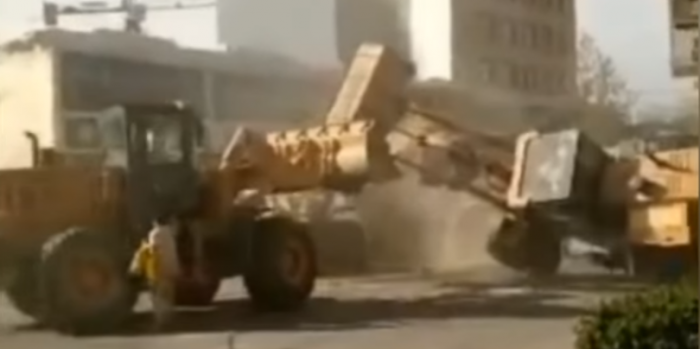 WATCH  Loaders fight over construction contract in China   YouTube